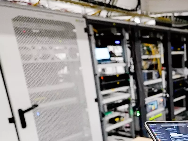 a blurry shot of the interior of the i14y Lab Server room.